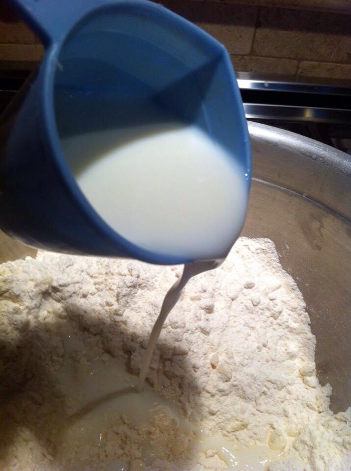adding-milk-to-scone-dough